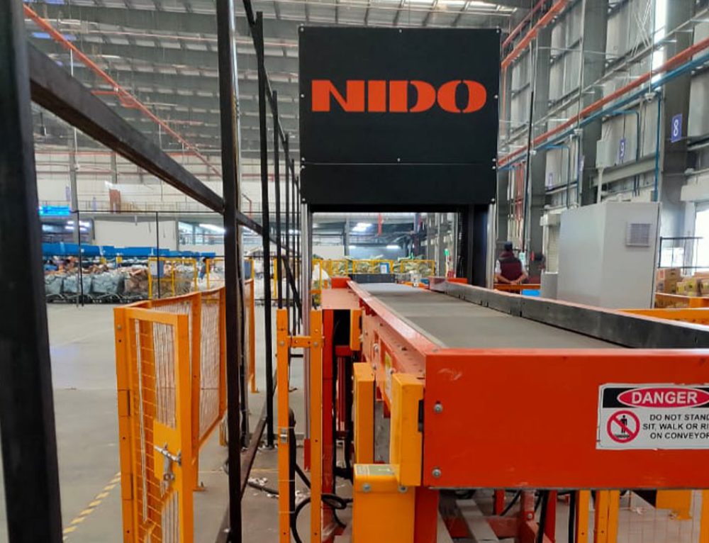 Dual Induct Belt Carriage Sorter with Dimensioning, Weighing & Scanning ...